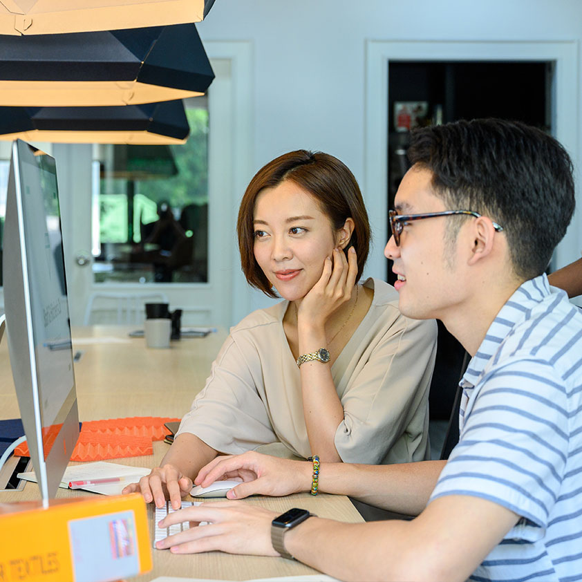 Man and Woman Looking at Computer Man and Woman Looking at Computer